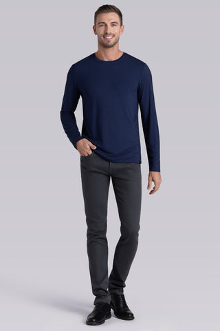 Model wearing Paramount Legion Blue long sleeve Icy Bamboo® crewneck, styled in gray pants.