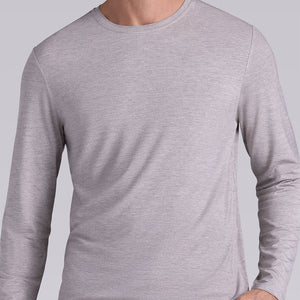 Model wearing Paramount Oak Tree Heather long sleeve Icy Bamboo® crewneck, styled in black pants.