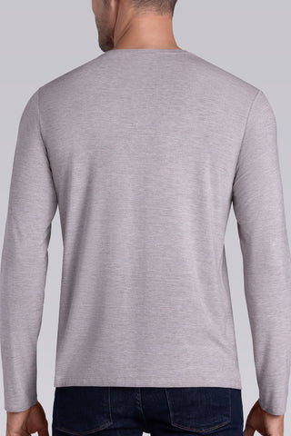 Model wearing Paramount Oak Tree Heather long sleeve Icy Bamboo® crewneck, styled in black pants.