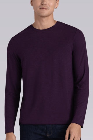 Model wearing Paramount Plum Heather long sleeve Icy Bamboo® crewneck, styled in black pants.