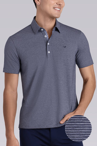Model wearing Clubhouse Navy Icy Cotton® short sleeve polo, styled with navy pants.