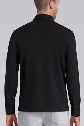 Model wearing Class Black long sleeve Icy Cotton® Jaquard Polo, styled with white pants.