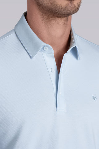 Model wearing Class Country Air long sleeve Icy Cotton® Jaquard Polo, styled with black pants.