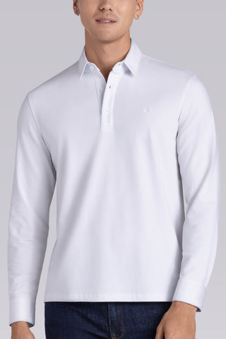 Model wearing Class White long sleeve Icy Cotton® Jaquard Polo, styled with white pants.