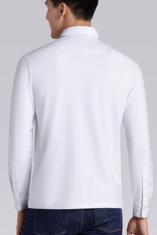 Model wearing Class White long sleeve Icy Cotton® Jaquard Polo, styled with white pants.