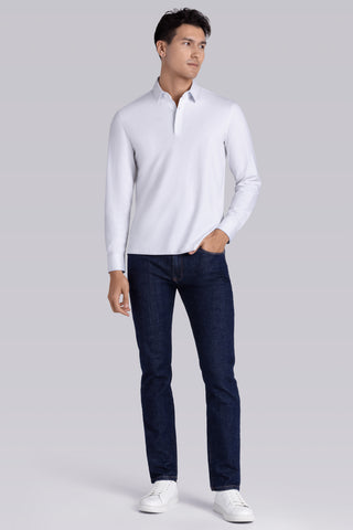 Model wearing Class White long sleeve Icy Cotton® Jaquard Polo, styled with white pants.