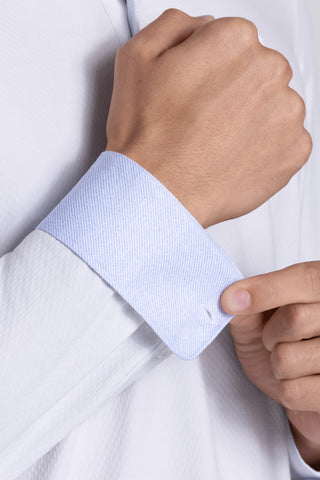 Model wearing Class White long sleeve Icy Cotton® Jaquard Polo, styled with white pants.