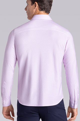 Model wearing Echo English Rose long sleeve tonal geometric print shirt, styled with black pants.