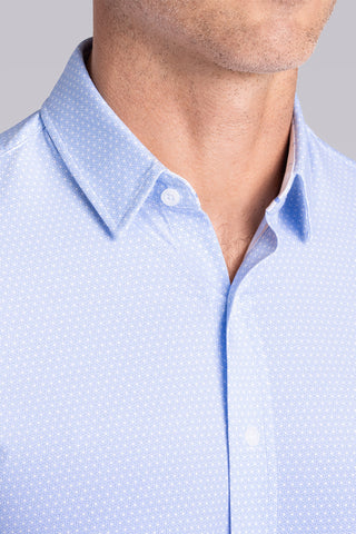 Model wearing Pulse Airy Blue Icy Cotton® long sleeve classic collar shirt, styled with black pants