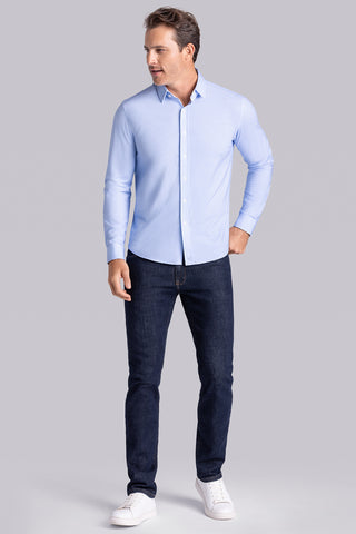 Model wearing Pulse Airy Blue Icy Cotton® long sleeve classic collar shirt, styled with black pants