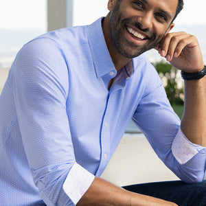 Model wearing Pulse Airy Blue Icy Cotton® long sleeve classic collar shirt, styled with black pants