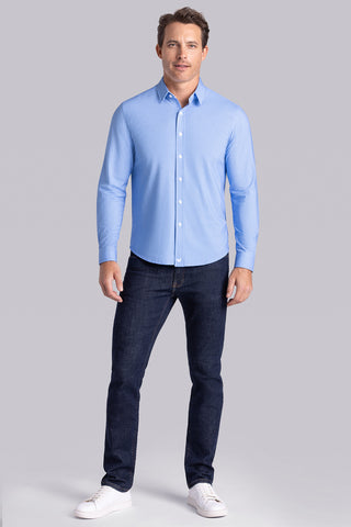 Model wearing Pulse Palace Blue Blue Icy Cotton® long sleeve classic collar shirt, styled with black pants