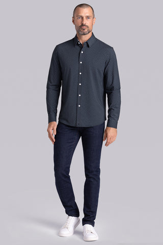 Model wearing Empower Black Green long sleeve dress shirt, styled black pants.