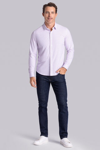 Model wearing Empower Light Pink long sleeve dress shirt, styled black pants.