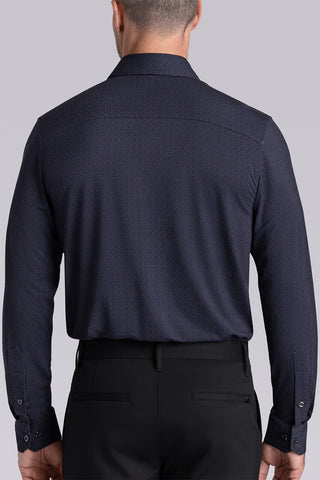 Model wearing the Excelsior Black Ink long sleeve dress shirt, styled with fitted black dress slacks.