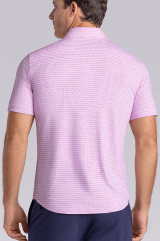 Model wearing Rhythm Raspberry Sorbet 6-Way Knit® short sleeve casual shirt with collar placket, styled with navy shorts.