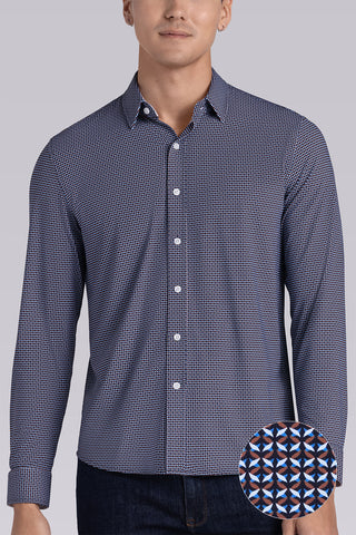 Model wearing Spry Navy Taupe long sleeve shirt with built in classic collar with geometric print, styled with jeans pants.