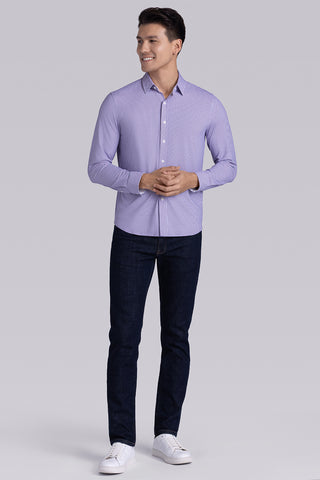 Model wearing Spry Pink long sleeve shirt with built in classic collar with geometric print, styled with jeans pants.