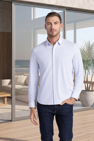 Model wearing Committed White Navy long sleeve shirt with built in classic collar with geometric print, styled with jeans.