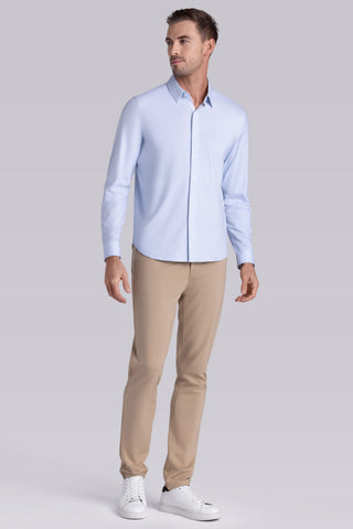 Model wearing Strive Country Air Icy Cotton® long sleeve shirt with classic collar and french placket, styled with khaki pants