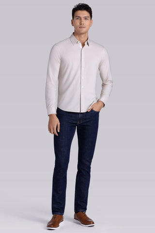 Model wearing Strive Light Taupe Icy Cotton® long sleeve shirt with classic collar and french placket, styled with black pants