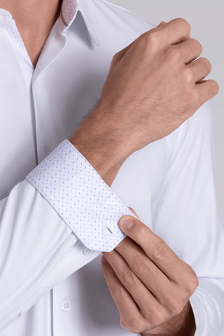 Model wearing Strive White Icy Cotton® long sleeve shirt with classic collar and french placket, styled with khaki pants