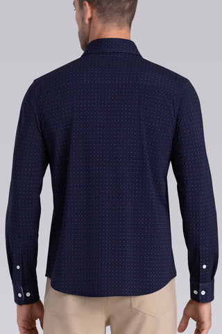 Model wearing Ignite Navy Red Icy Cotton® long sleeve shirt with classic collar and placket, styled with khaki pants