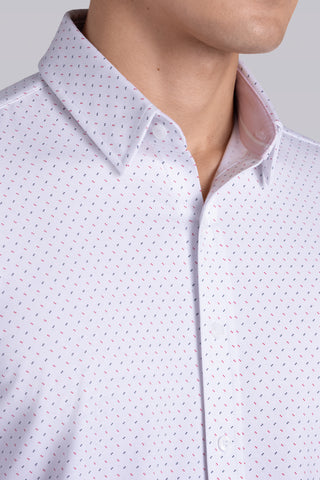 Model wearing Ignite White Icy Cotton® long sleeve shirt with classic collar and placket, styled with navy pants