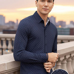 Model wearing Prism Black 6-Way Knit® long sleeve classic collar shirt, styled with black pants 