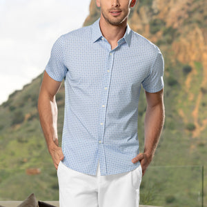 Model wearing Imperial Light Blue short sleeve micro print shirt, styled with white shorts.